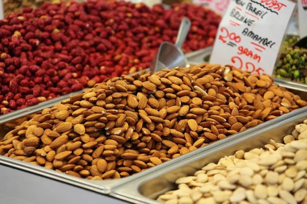 A close-up view of a mix of nutritious seeds, including pumpkin seeds, sunflower seeds, flaxseeds, and sesame seeds, ideal for a healthy diet.